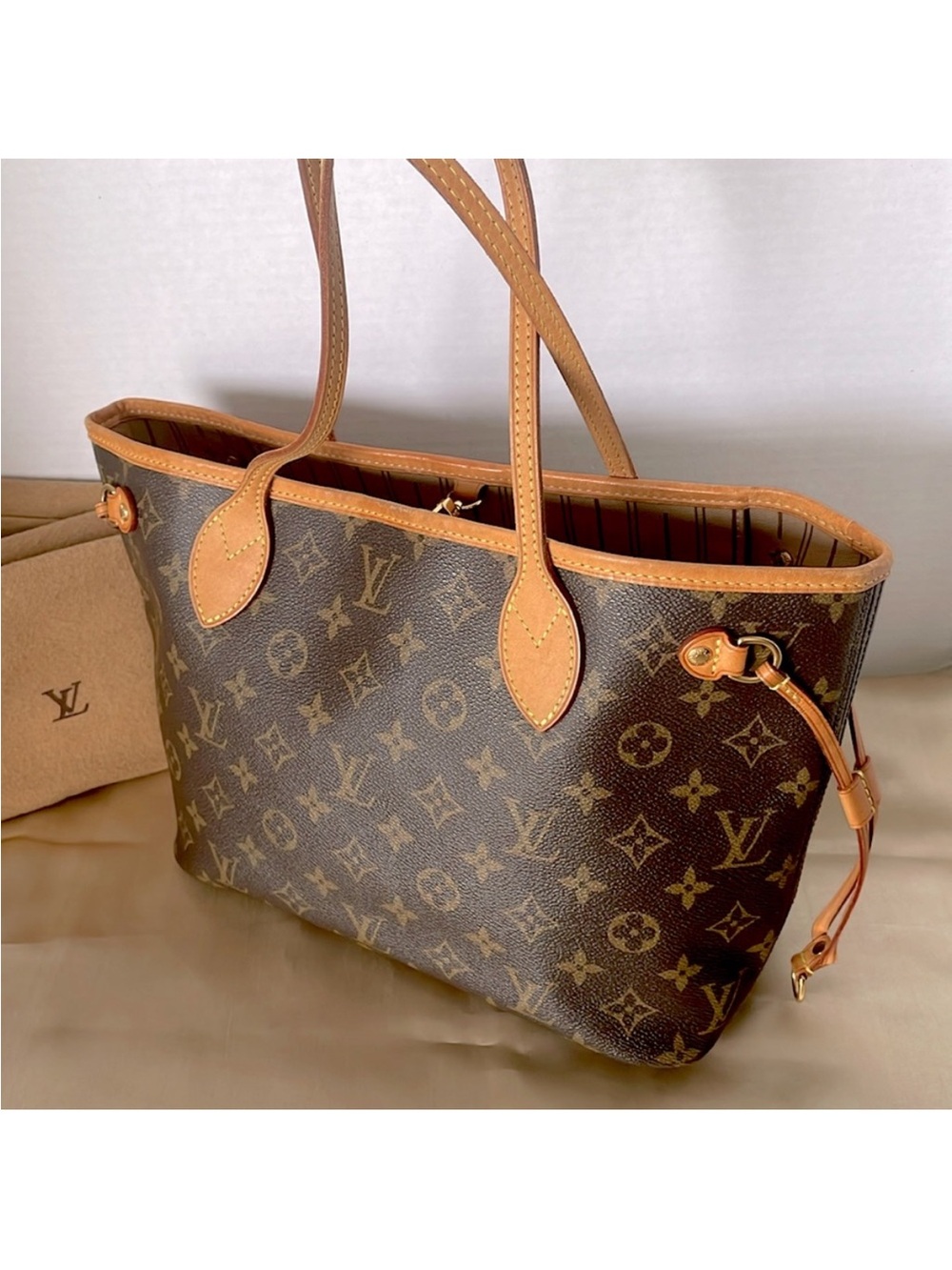 Louis Vuitton Monogram Never Full PM Handbag.